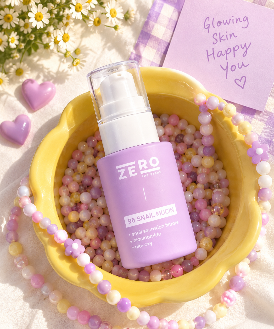Zero The Start 96 Snail Mucin serum bottle styled with colorful beads, flowers and a “Glowing Skin Happy You” note